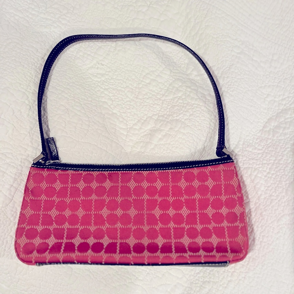 Cutest Kate Spade mini shoulder bag. Hot pink and black leather detail.
